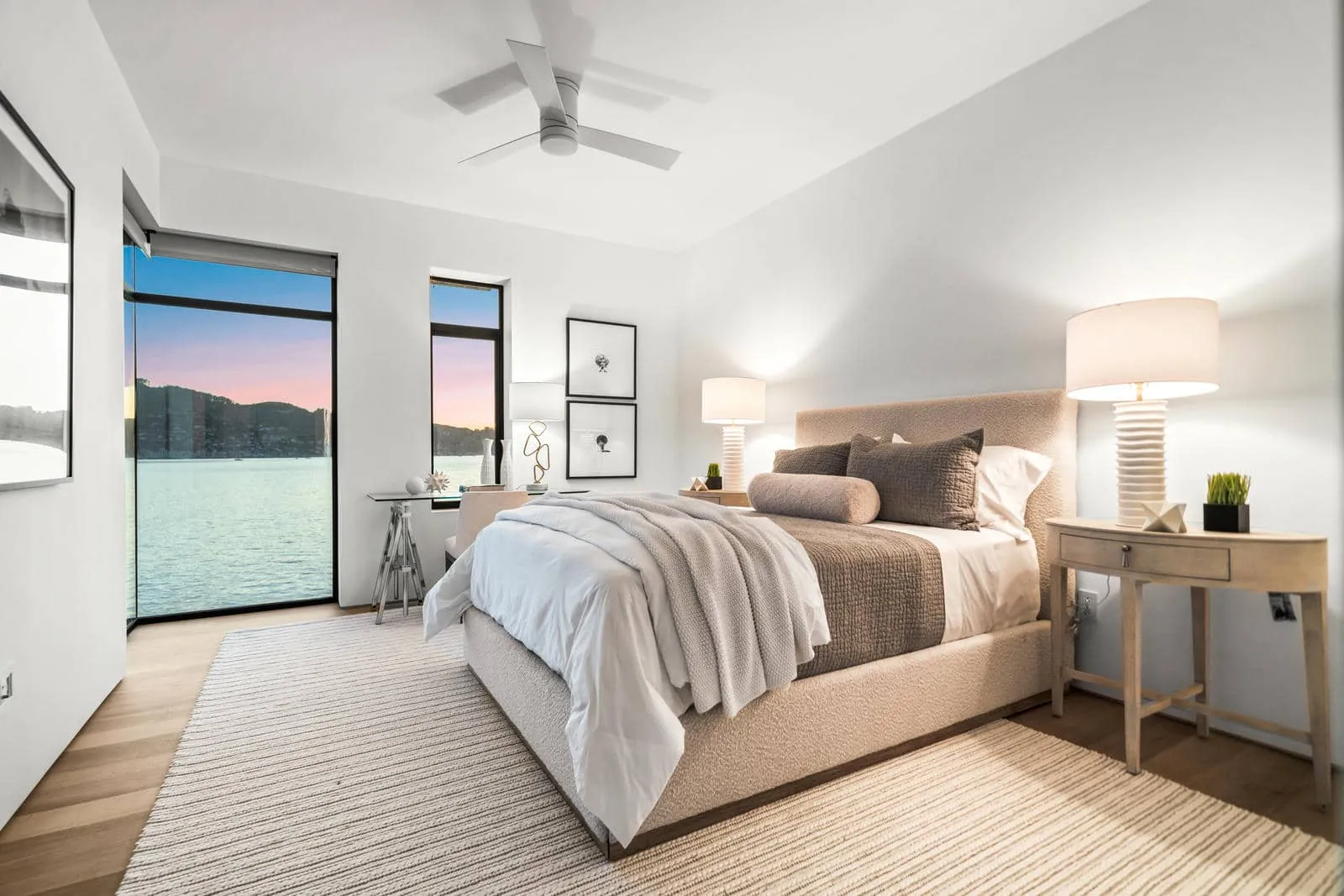 IMG-27 Hero banner image of waterfront estate captured at golden hour, representing premium real-estate media services.